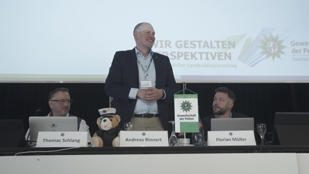 Foto: Adreas Rinnert steht mit Kollegen auf der Bühne