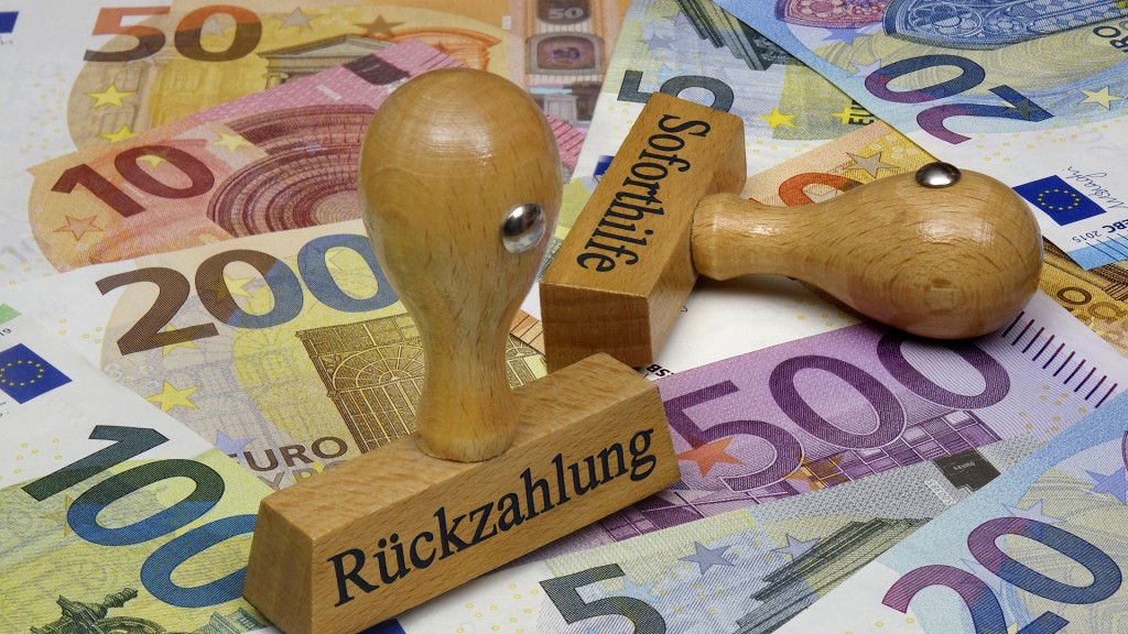 Foto: Symbolbild. Auf Geldscheinen stehen Stempel mit den Schriftzügen Soforthilfe und Rückzahlung.