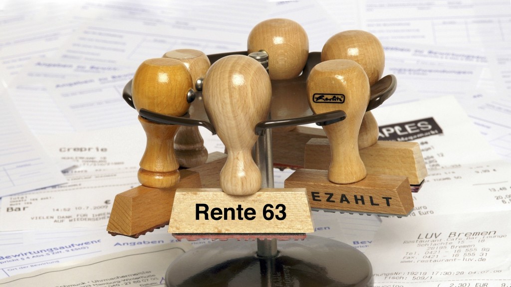 Stempelhalter mit Holzstempel mit der Aufschrift: Rente 63